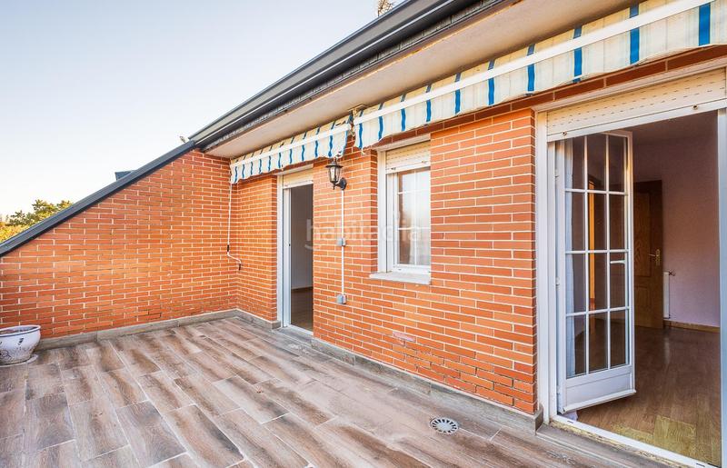 Foto c5f55369-e6f2-4179-9c75-0c9d68d4c4ec. Casa adossada amb calefacció aparcament a Guadarrama