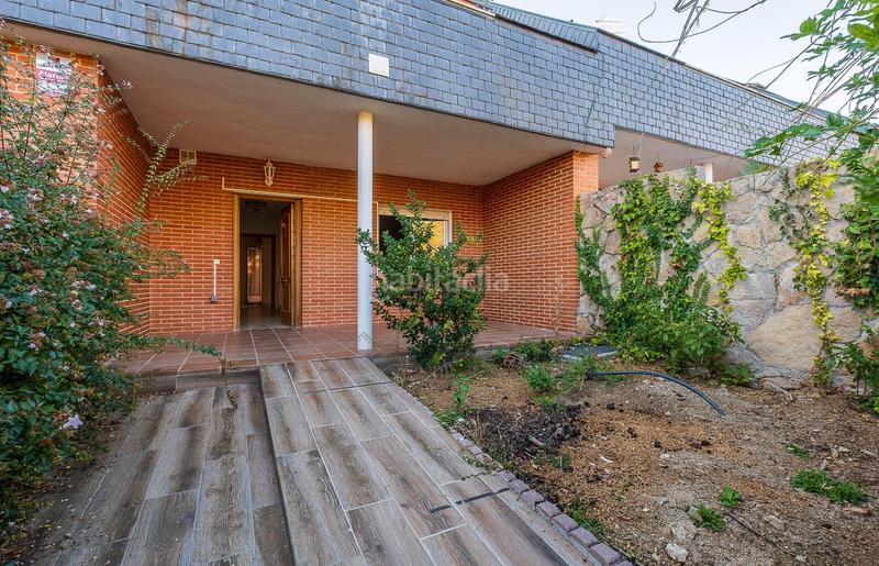 Foto f2837607-fd56-4abd-be40-168a4c52b1d4. Casa adossada amb calefacció aparcament a Guadarrama