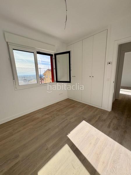 Foto a2ddd6da-2fea-4b4e-9cd2-b3e6fc930eb1. Casa adossada amb calefacció aparcament a Collado Mediano