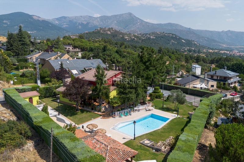 Foto ad20c117-d669-46d0-8440-f40f6216f722. Chalet con riscaldamento parcheggio piscina in Becerril de la Sierra