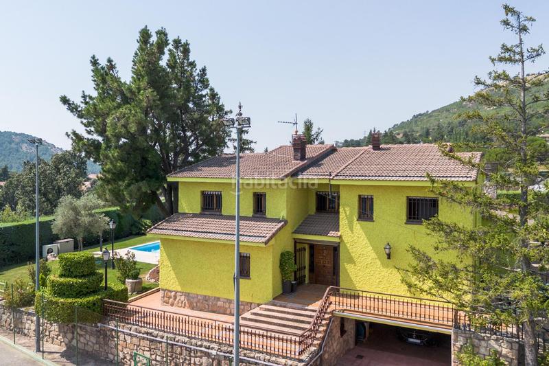 Foto e261b693-d909-4253-a1de-4586fd84f715. Chalet con riscaldamento parcheggio piscina in Becerril de la Sierra