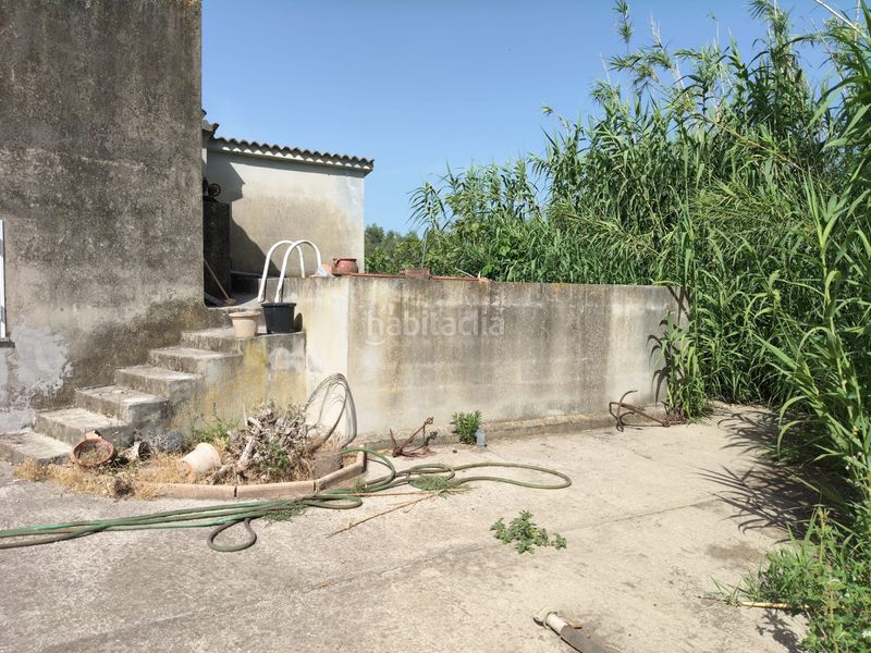 Foto 6eb597d6-7503-4df9-ab7f-f96111f4a2a7. Masia amb xemeneia a Muro