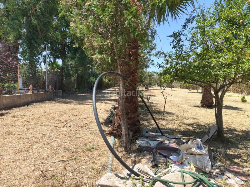 Foto a028479f-a595-4e0a-8070-a27eeb27bf03. Masia amb xemeneia a Muro
