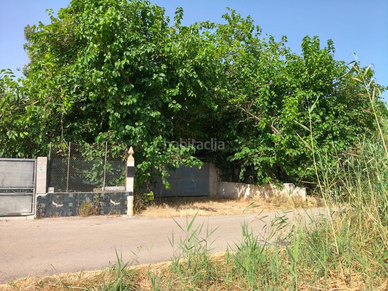 Foto bc364838-1f7a-444d-9b62-0aad1a34afa8. Masia amb xemeneia a Muro