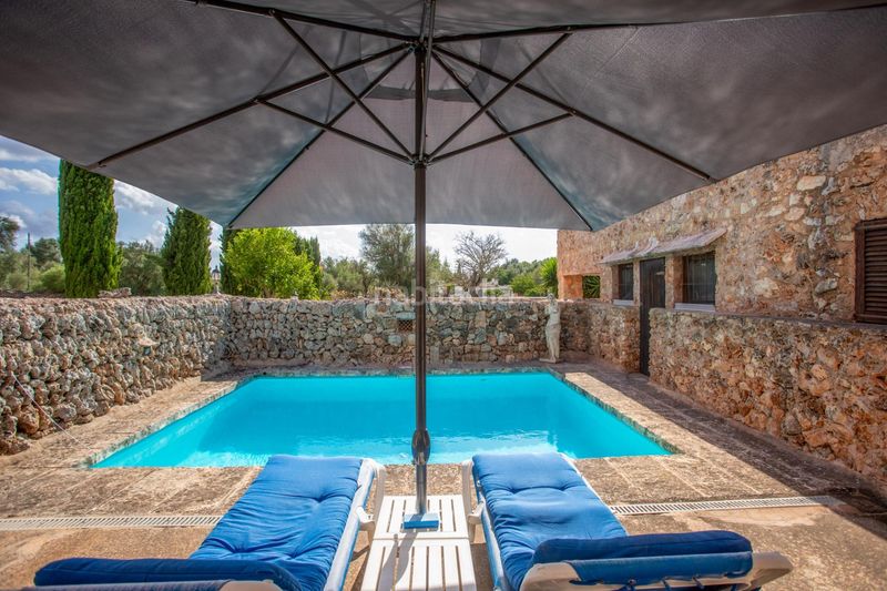 Foto df8e85c4-4971-4e80-98bb-008c85b3cd51. Casa amb calefacció aparcament piscina a Sencelles