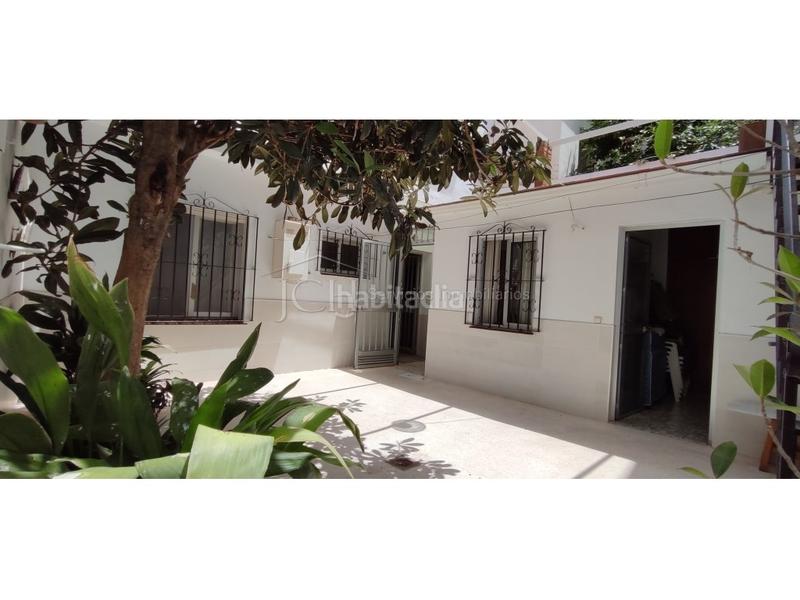 Foto 0ea3feed-a26f-40d6-8cd8-5f0a8daa31cb. Casa en calle san carlos 4 casa de 4 dormitorios, con patio y solárium en las lagunas en Mijas
