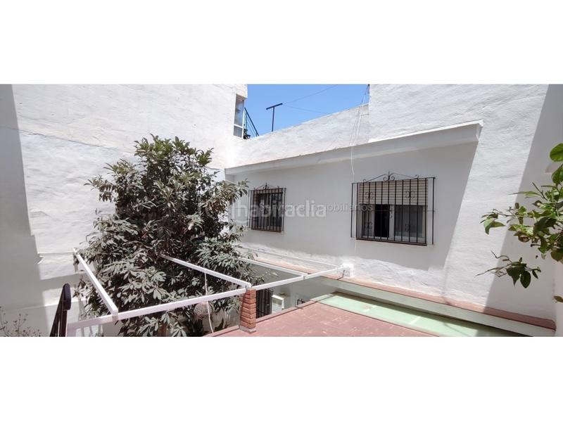 Foto b1f9b723-4ce3-4ea8-a5d3-5714c8b2f188. Casa en calle san carlos 4 casa de 4 dormitorios, con patio y solárium en las lagunas en Mijas