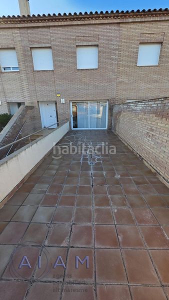 Foto f5d5dfd7-974f-4481-80aa-fc0065a4439c. Casa adossada amb aparcament a Tordera Tordera