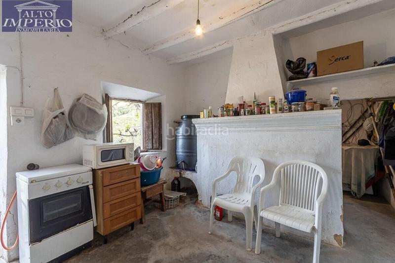 Foto df001167-18f2-494d-9a96-1d81f36bbb80. Masía en calle extrarradio 301 finca de recreo con amplio huerto junto a los cahorros en Monachil