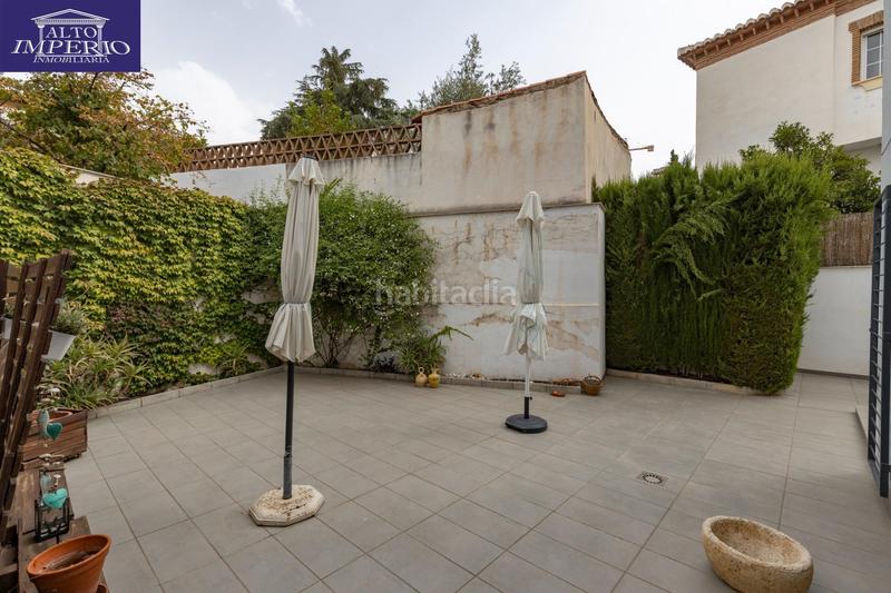 Foto 2472be7f-5fb4-40f2-a974-3b8707f4728c. Casa pareada vivienda unifamiliar con patio, jardín y todas las comodidades en Granada