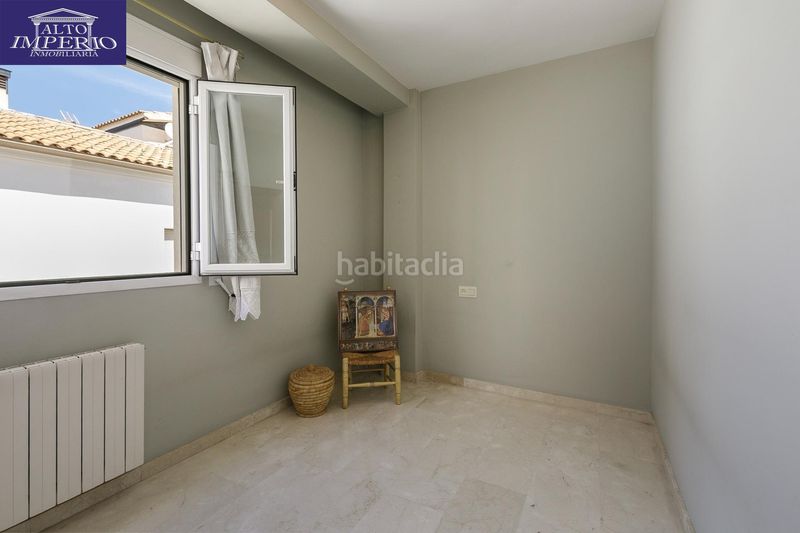 Foto 10e05ca5-b0b6-4f27-adbe-045b4e39bc88. Casa adossada amb calefacció aparcament a San Miguel Armilla