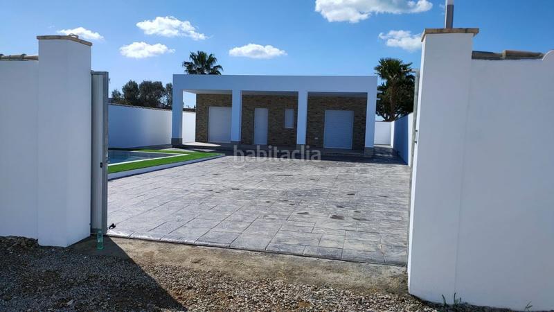 Foto 5806328a-f050-4a1e-9627-3320c3c9f806. Xalet amb calefacció aparcament piscina a Las Lagunas - Campano Chiclana de la Frontera