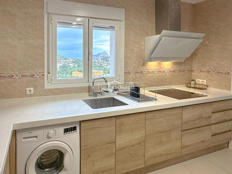 Foto 58d5a4f6-5ab1-43a5-bb72-a7336f7b66c3. Location appartement avec piscine dans La Empedrola Calp