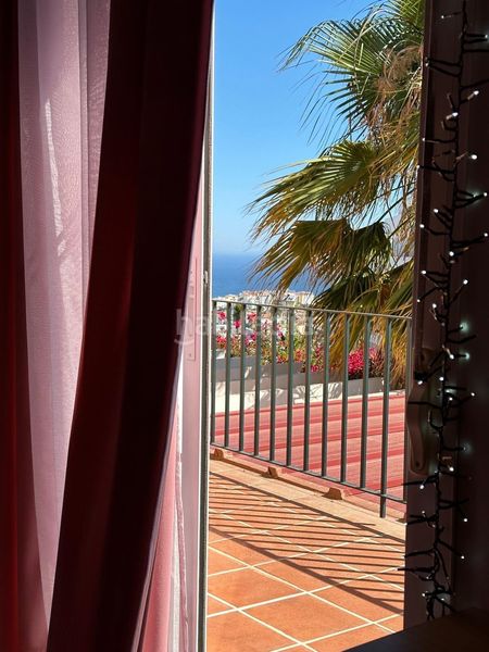 Foto c874fdb6-bdce-4468-b006-614bc8528ab8. Casa aparellada amb aparcament piscina a Riviera del Sol Mijas
