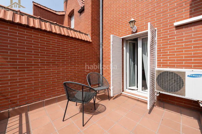 Foto db8857fd-e426-4354-bc7f-6d2a82dab2c6. Casa adossada amb calefacció aparcament a Segunda Fase Tres Cantos