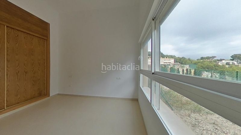 Foto a153111d-33fa-44ef-8d6b-975cdc5fc467. Casa aparellada amb piscina a Oltamar - Cucarres Calp