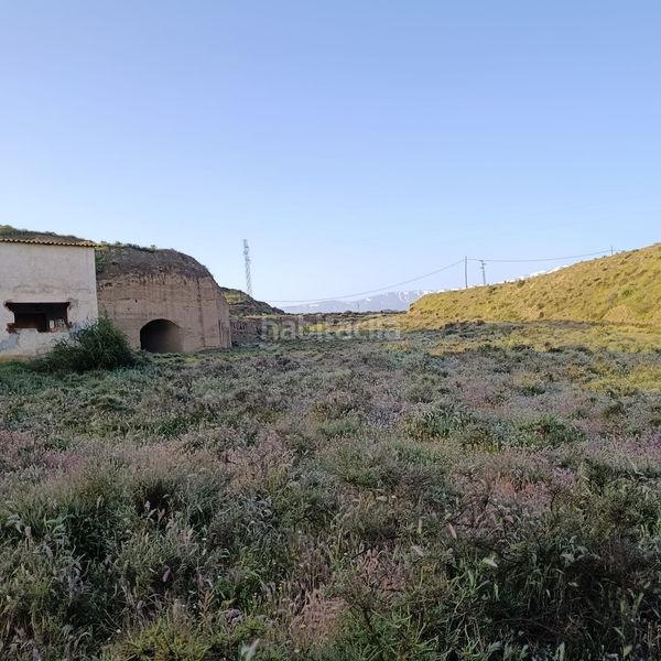 Foto 3e52ef8b-0fe5-4178-bfce-f1c820167fa4. Finca rústica solvia inmobiliaria terreno con edificación en Guadix
