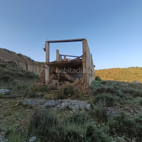 Foto 8fe8093c-3ac9-44c6-9418-55d9e8fdc025. Finca rústica solvia inmobiliaria terreno con edificación en Guadix