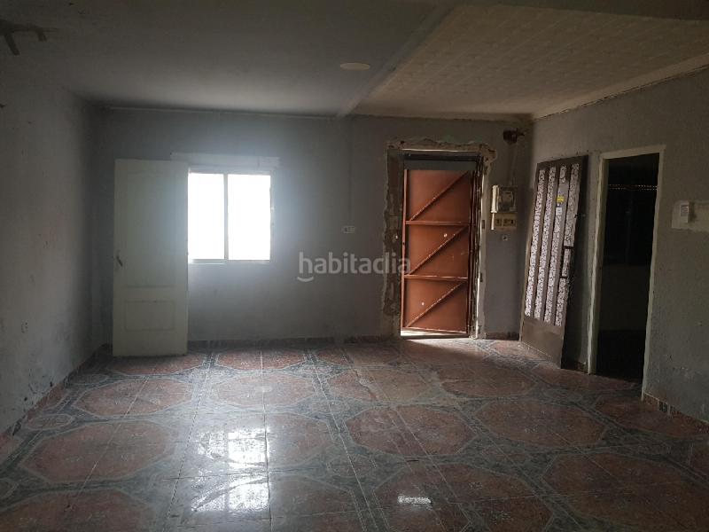 Foto ae1153e1-f0f5-4360-ba71-fc018bdb4667. Casa aparellada a Carlet