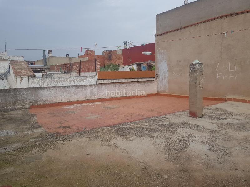 Foto b5f54126-cb94-457e-ad30-cffceb22b7c9. Casa aparellada a Carlet