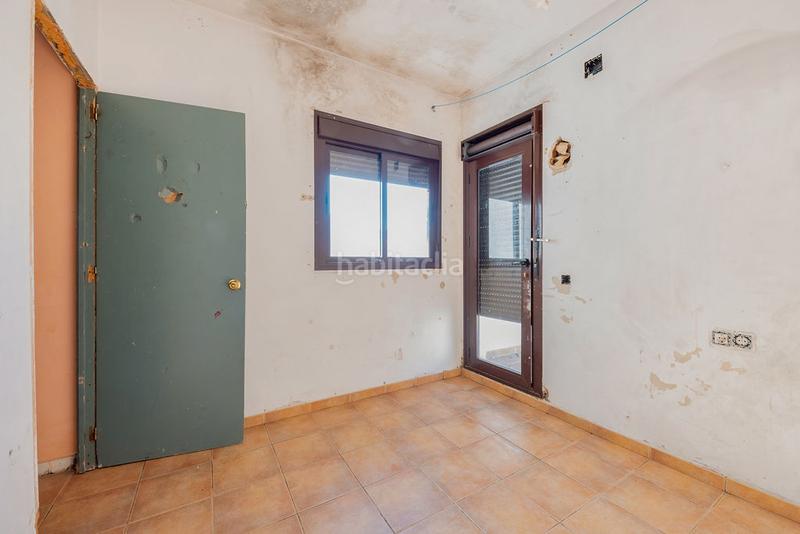 Foto f5676c8f-f539-4055-8f04-a2657dd6610d. Casa aparellada a Cortegana