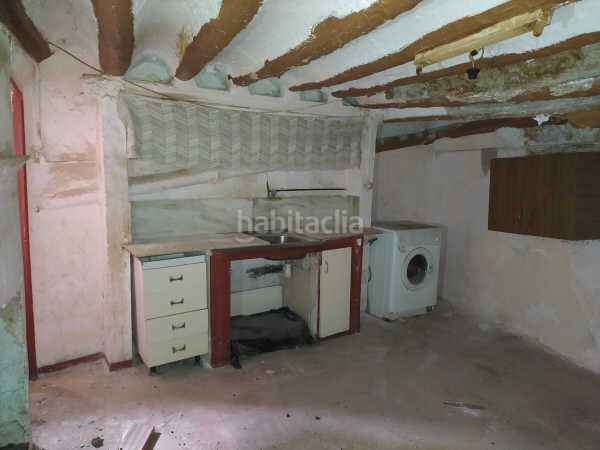 Foto cd36733f-e687-44d1-b793-4341ab2df74c. Casa aparellada a Cehegín
