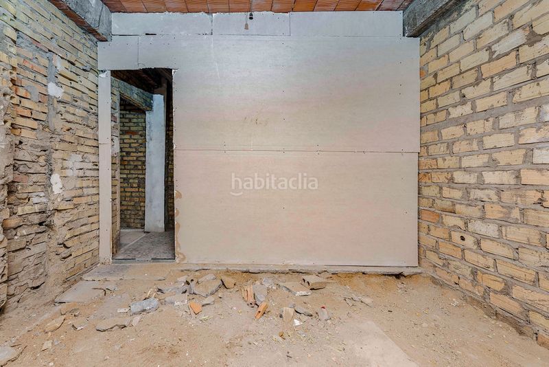 Foto 74e3d37f-4765-4b33-ba7a-cbcb2c04fc4e. Casa aparellada a Palmete Sevilla