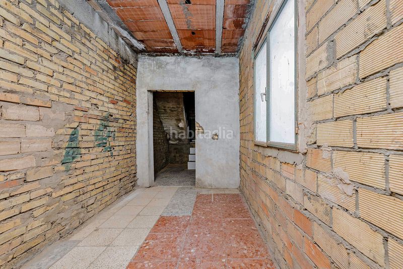 Foto 9f122d21-7822-479a-9cf8-f18e2a3948f1. Casa aparellada a Palmete Sevilla