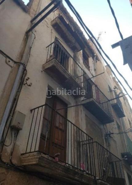 Foto 54c59102-7f73-4a23-8e74-cce6a489e5a9. Casa aparellada a Centre Tortosa