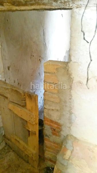 Foto e32c623a-0209-4cd5-af86-fd16050d5344. Casa aparellada a Talavera