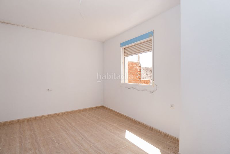 Foto b205e014-52ce-461e-9b5c-b8b25933b570. Casa aparellada a Abanilla