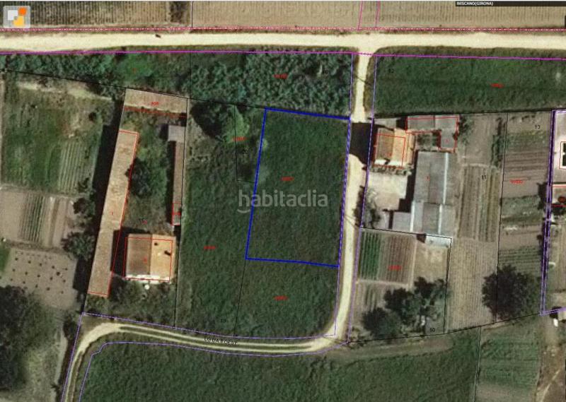 Foto 5ad7a43d-f1c7-4f83-be10-318e1213c121. Finca rústica solvia inmobiliaria suelo urbanizable en Bescanó