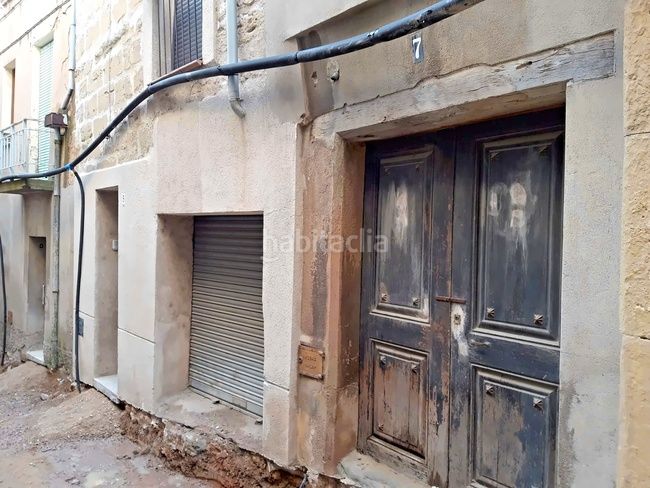Foto 2c1ea881-0cb8-47e2-88e7-32ab97a12e18. Casa aparellada a Calaf