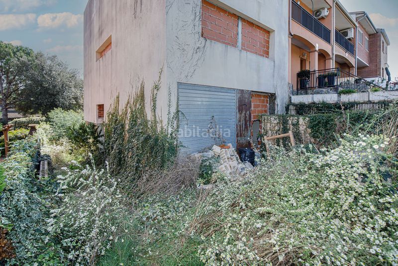 Foto 51ddb36c-b495-45f8-81b5-bc7d63c30eed. Casa aparellada a Caldes de Malavella