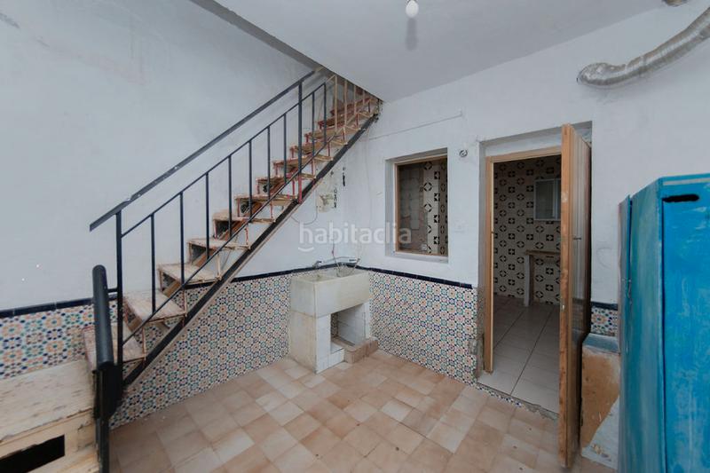 Foto 069eefe8-94bb-49e9-b835-7476fe22a96c. Casa aparellada a Atarfe