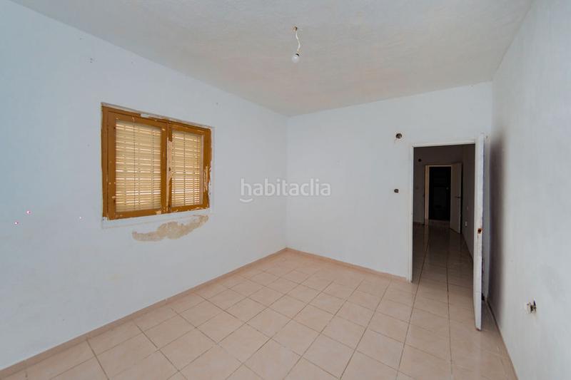 Foto 39f6b38e-2173-4ac0-b9c0-6a0fd3edd22e. Casa aparellada a Atarfe