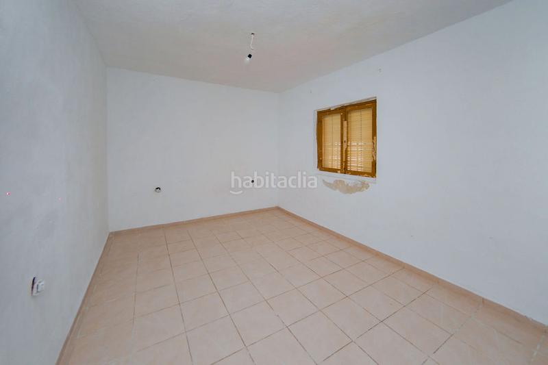 Foto aa518bb6-3116-4a0a-8668-9599b98e9fd1. Casa aparellada a Atarfe