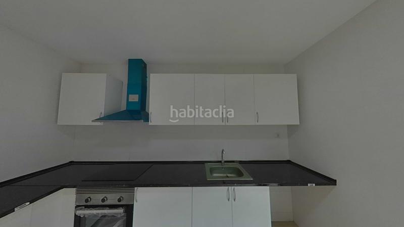 Foto 56f0eb24-78b9-41ca-9714-d2e991af6bc3. Casa aparellada amb calefacció aparcament piscina a Santa Coloma de Gramenet