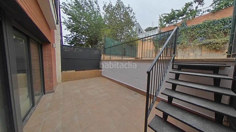 Foto ae5ab79e-992f-49f9-9bae-69acde60ed5d. Casa aparellada amb calefacció aparcament piscina a Santa Coloma de Gramenet