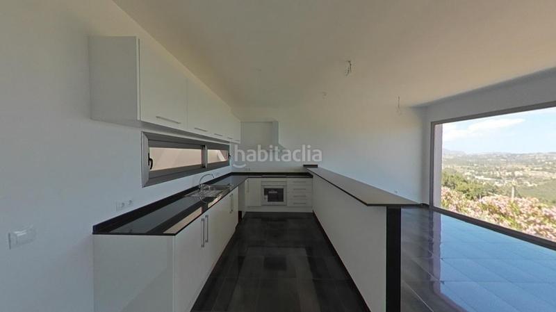 Foto 3d7db39e-3a88-4e5f-ae93-88cb1c47fd85. Casa aparellada a Oltamar - Cucarres Calp