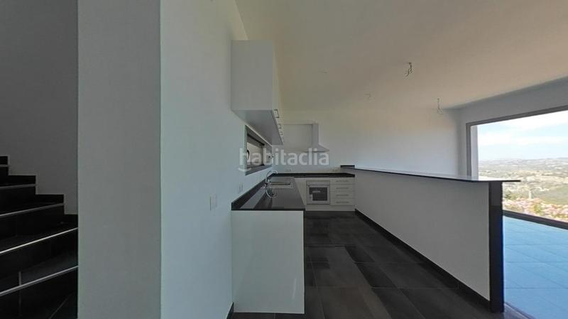 Foto c4c002ac-3b0e-4eb8-8a1b-042b04f97835. Casa aparellada a Oltamar - Cucarres Calp