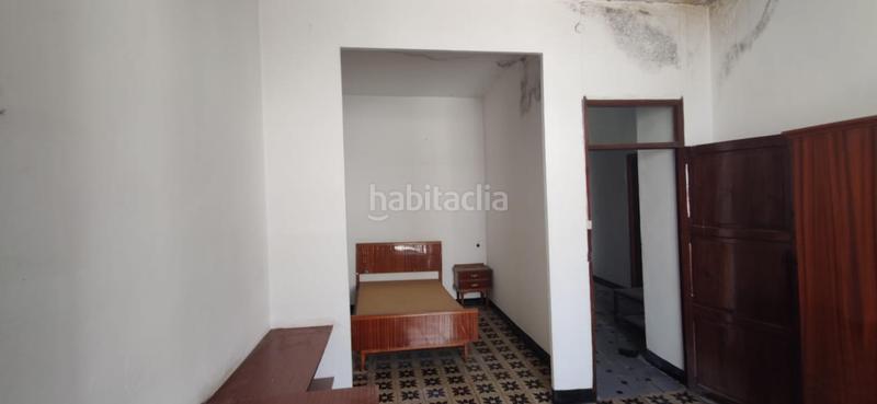 Foto c084ea4d-72e6-4aa8-97ef-8ec7adc5ad23. Casa aparellada a Quatretonda