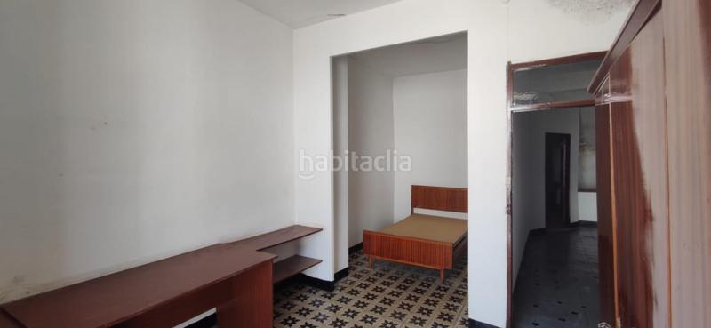 Foto d7c894db-f471-486f-a9c8-db4bf73eea10. Casa aparellada a Quatretonda