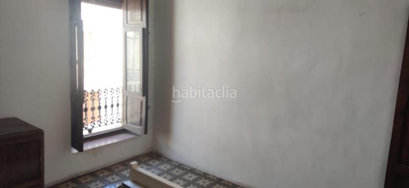 Foto f1b56b74-bfda-4e82-ba1a-e74760004951. Casa aparellada a Quatretonda