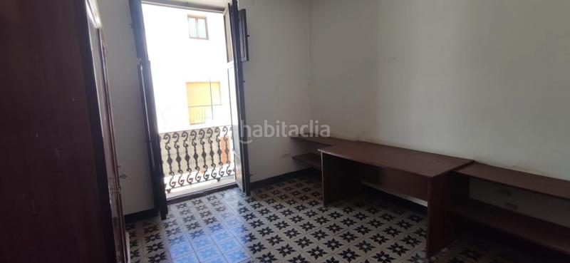 Foto f220bfcb-99ef-453a-8227-c6d0da653fce. Casa aparellada a Quatretonda