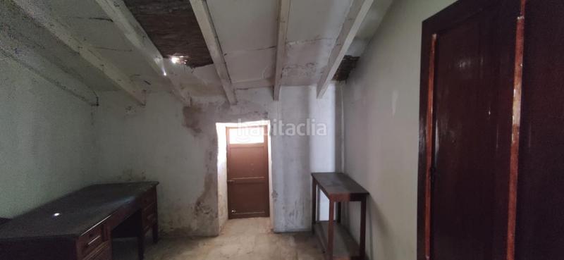 Foto f5fd1103-4205-4ba6-925b-a9868e2d9d76. Casa aparellada a Quatretonda