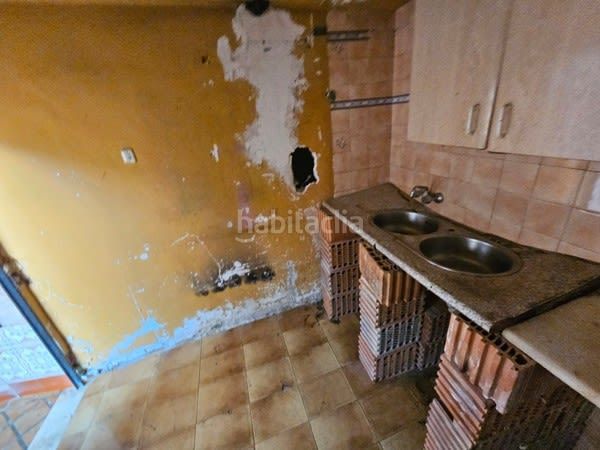 Foto b930ddce-9490-445e-9a54-06fc01f5f69a. Casa aparellada a Rute