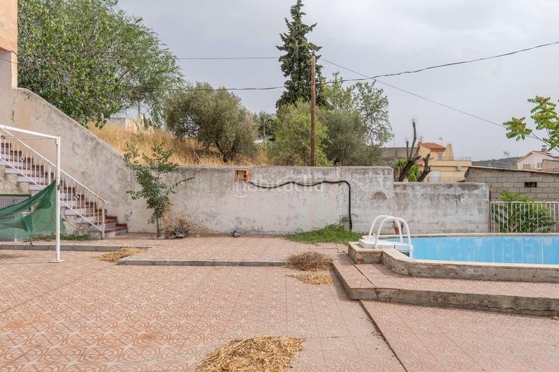 Foto 912f2a14-14c1-4071-8cba-5a2425423480. Chalet en camino de la barrera (far) 58 el Fargue 2000 metros de parcela segregable con chalet de 178m en tres plantas mas nave de 90 metros en Granada