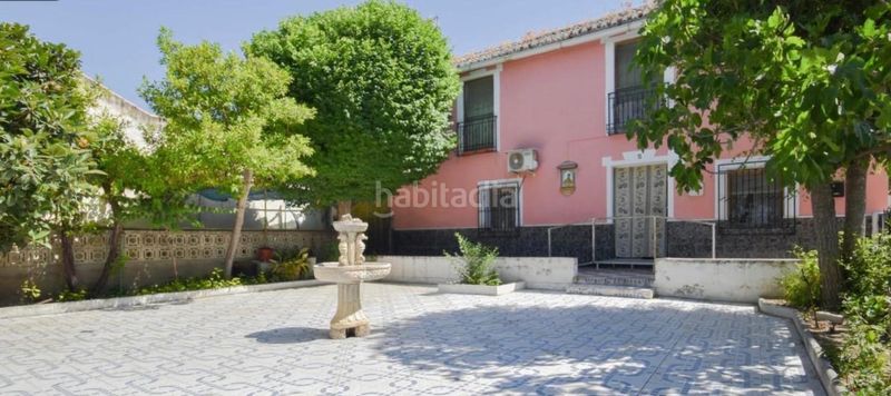 Foto 84a6ef9b-1cf0-4b4d-ac7b-27022ff1da10. Casa amb aparcament a Atarfe