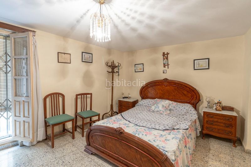 Foto 10be288c-0630-490b-aca1-a3675702c99e. Casa adosada en calle calle agua de cartuja 9 bonita casa para reformar en Granada